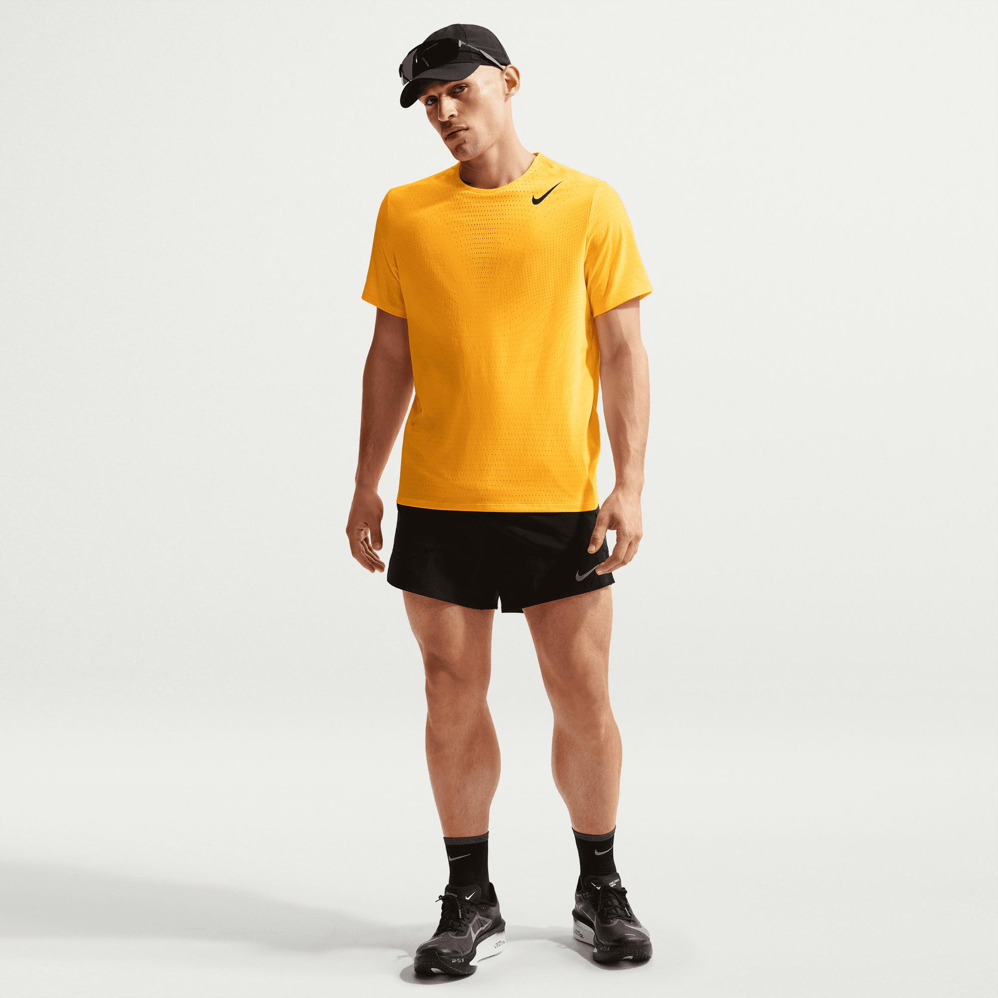 yellow nike running top