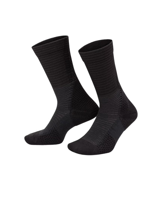 Pair of black socks on a white background